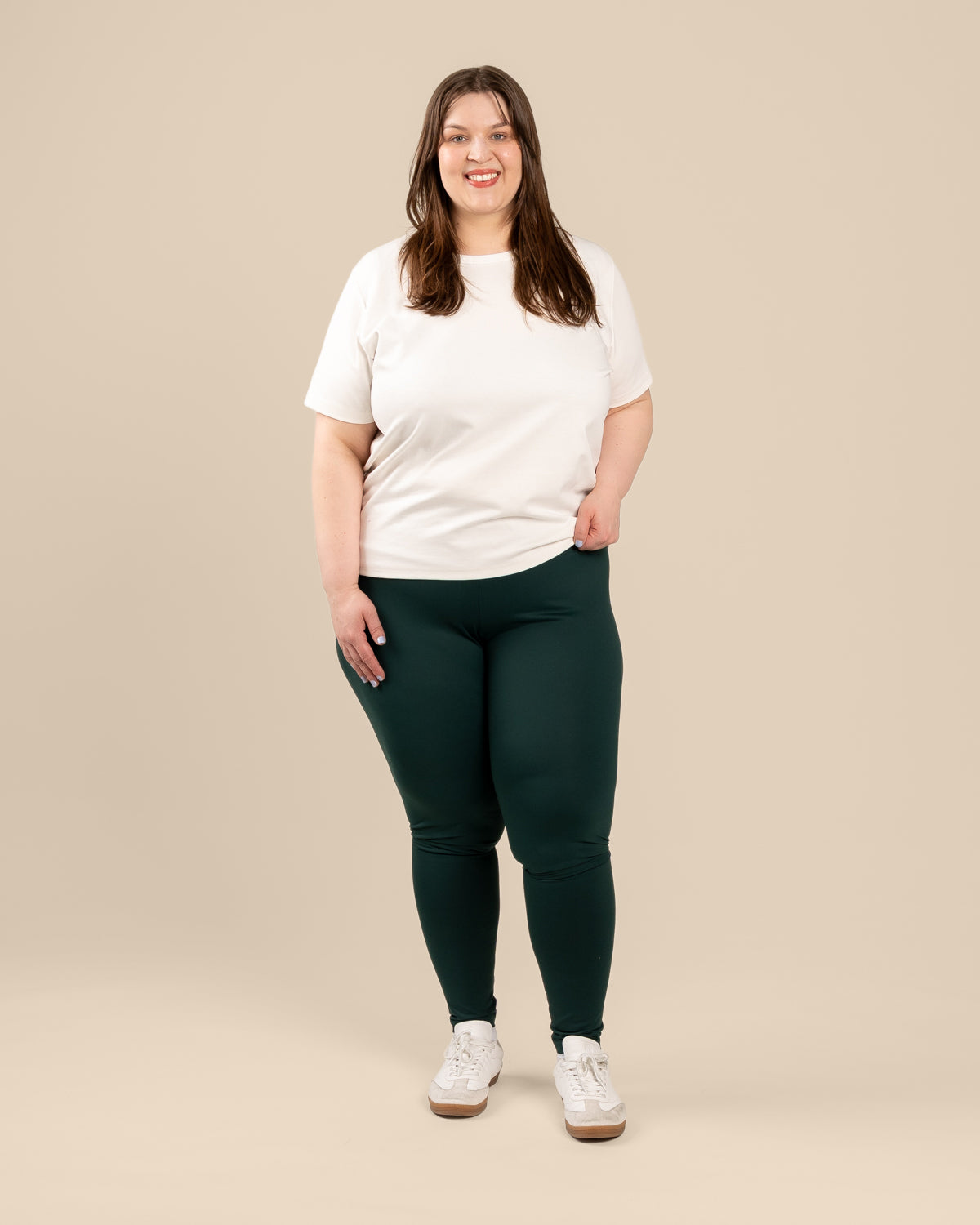 Tummanvihreät leggingsit