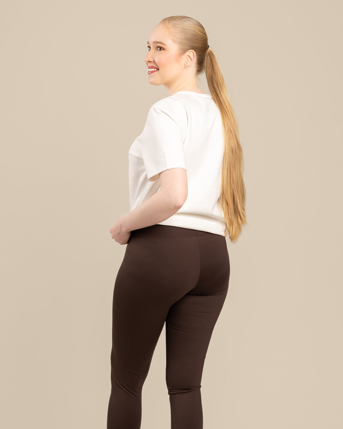 Tummanvihreät pitkät leggingsit